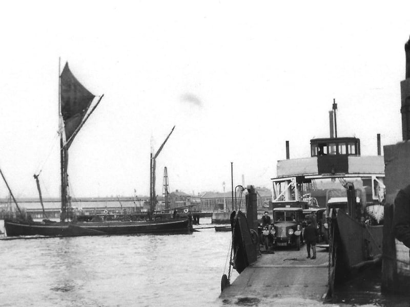 A marvellous view from Point, Old Portsmouth out into the harbour with a Thames barge passing by.