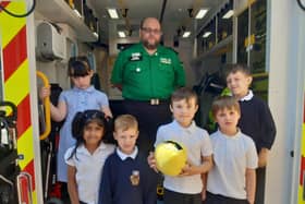 Children from Morelands Primary School learn about the work of the ambulance service