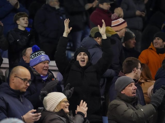 Pompey fans backed their team to a crucial Championship survival win over Cardiff last night.