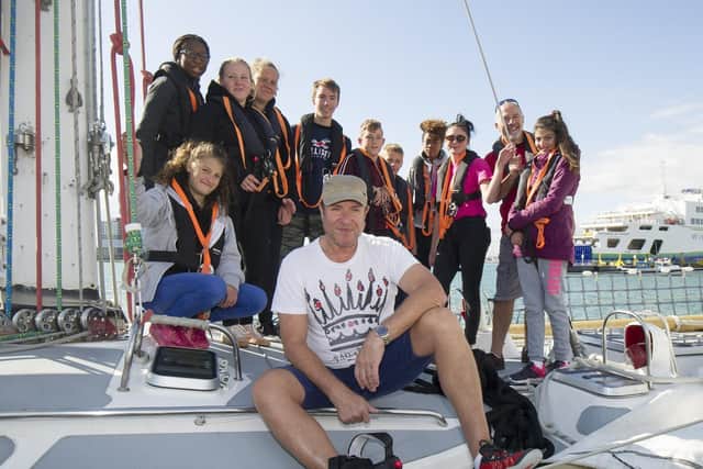 Simon Le Bon with members Tall Ships Youth Trust team  on a 72-foot Challenger yacht in the Solent. Picture: Jonathan Buckmaster