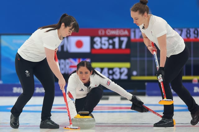 Hailey Duff, Eve Muirhead and Jenn Dodds in action