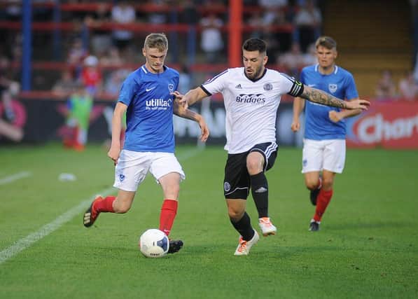 Eoin Teggart, left, has joined Gosport on a month's loan from Pompey. Picture: Habibur Rahman
