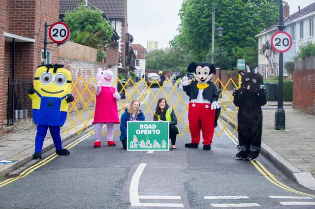 St Jude's Primary school is trialling the SusTrans school streets initiative. Characters in fancy dress welcoming children to school with Safeguarding manager, Hannah Chainey with Head Teacher, Rachael Osbourne at St Nicholas Street, Portsmouth. Picture: Habibur Rahman