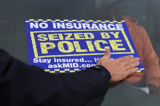 Thousands of uninsured vehicles have been seized by police in a four year span. Gus Park, managing director for AA Insurance Services said some are risking it as 'people try to cut their costs'. Picture: Joe Giddens/PA.