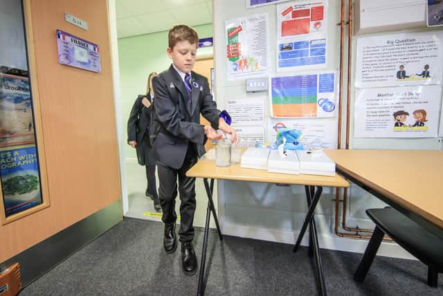A pupil uses hand sanitiser has he enters a classroom at a school in Yorkshire, where students returned earlier this week
Picture: Danny Lawson/PA Wire