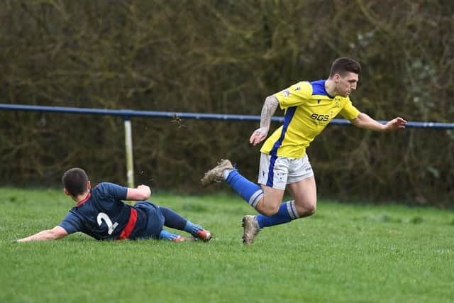 Ryan Chandler is brought down to give Denmead a penalty which Danny Lucas converted.

Picture: Neil Marshall