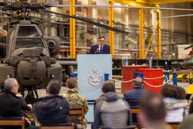 Defence procurement minister Jeremy Quin address an audience of journalists and members of the armed forces about the new Apache AH64-E.
