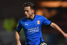 CREWE, ENGLAND - DECEMBER 01: Jack Payne of Swindon during the Sky Bet League One match between Crewe Alexandra and Swindon Town at The Alexandra Stadium on December 01, 2020 in Crewe, England. Sporting stadiums around the UK remain under strict restrictions due to the Coronavirus Pandemic as Government social distancing laws prohibit fans inside venues resulting in games being played behind closed doors. (Photo by Gareth Copley/Getty Images)