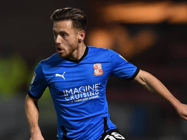 CREWE, ENGLAND - DECEMBER 01: Jack Payne of Swindon during the Sky Bet League One match between Crewe Alexandra and Swindon Town at The Alexandra Stadium on December 01, 2020 in Crewe, England. Sporting stadiums around the UK remain under strict restrictions due to the Coronavirus Pandemic as Government social distancing laws prohibit fans inside venues resulting in games being played behind closed doors. (Photo by Gareth Copley/Getty Images)