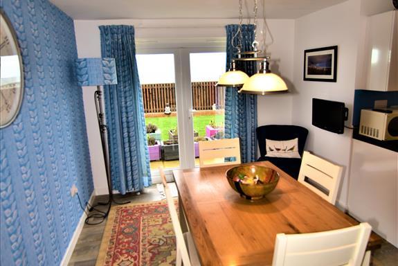 The dining room benefits from easy access to the rear garden.