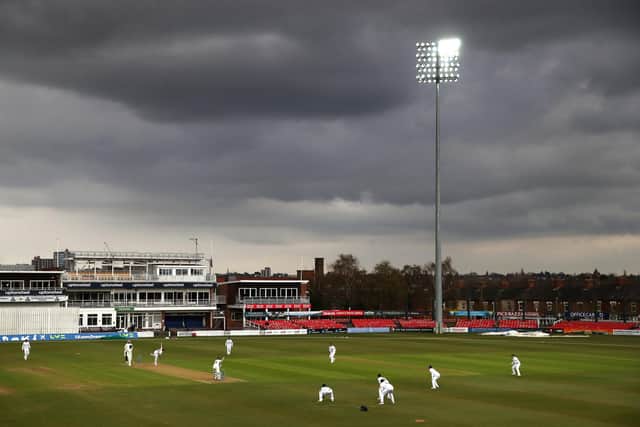 Cricket in England in April - the floodlights are turned on after tea at Grace Road. Photo by Alex Pantling/Getty Images.