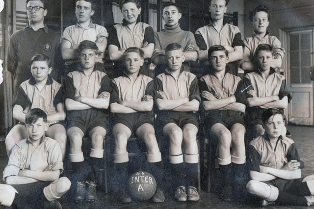 Hilsea Modern School football team 1956 Back Row: Mr Burchil, Gauntlett E, Porter, Dobbin, Harrison, Guy. Front Row: Murphy, Cramer, Lee, Harland, Wheatley, Smithard. Seated on Floor: Gauntlett T, Bonner. Picture: Courtesy of Tom Gauntlett