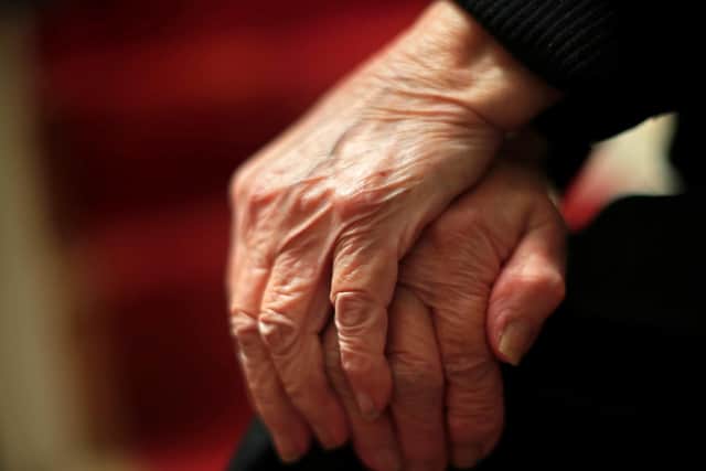 The hands of an elderly woman are pictured as fears are raised about a looming dementia care crisis in the Portsmouth area
