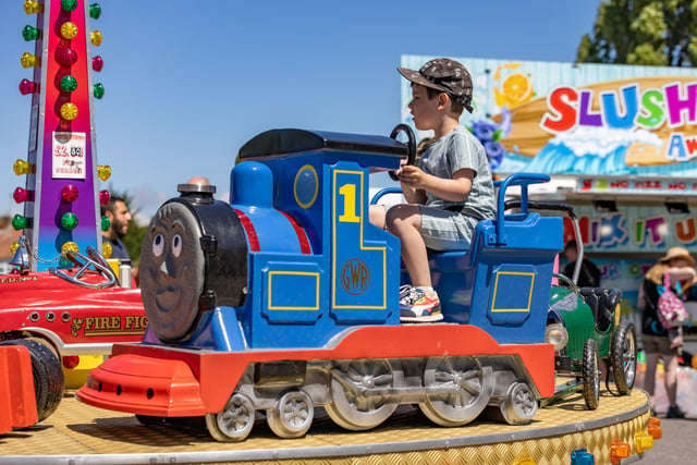 Toby Stewart (4) enjoys one of the rides at the Rainbow Centre Family Fun Day. Picture: Mike Cooter (240623)