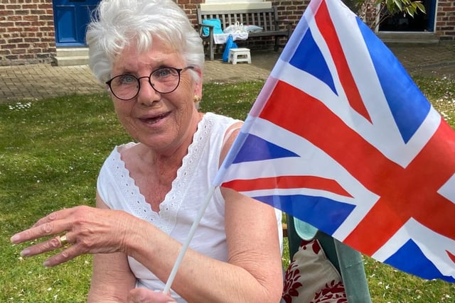 Lilian Appleby feeling patriotic in Trafalgar Square.