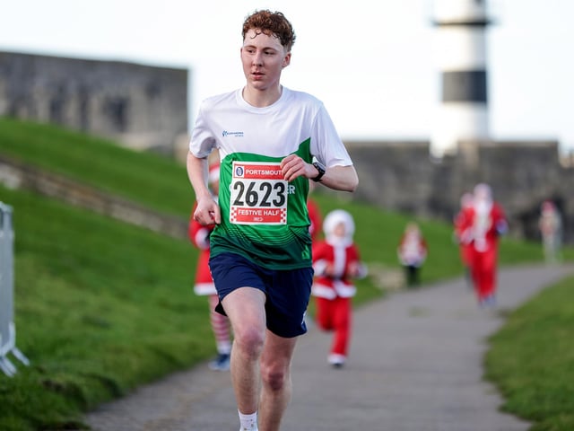 A number of runners took to the picturesque coastal route to take on the Portsmouth Coastal Waterside Marathon, Festive Half Marathon, as well as the Southsea 5k and 10k Turkey Trot. Picture: Chris  Moorhouse (221224-77)