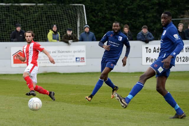 Moussa Diarra, right, playing for Barrow against Brackley in 2018. Diarra's new Westleigh Park colleague Bedsente Gomis is also in the picture.