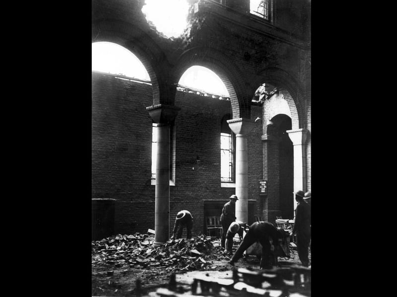 St Cuthbert's Church, Copnor during the blitz
The first damage to the church buildings occurred on November 10th 1940, when a high explosive bomb fell, tearing a hole in the North side of the nave. Because part of the roof was open to the sky, the congregation had to bring umbrellas on rainy days. On April 17th 1941, a landmine in Hayling Avenue destroyed the East end of the church, severely damaging the rest of the building and completely flattening the Parish Hall (the original Mission Church). The following day, the vicar erected a large wooden cross on the rubble and nailed to it a victory V.
