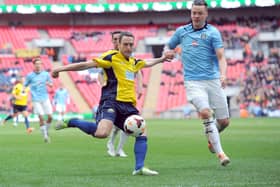Justin Bennett, left, scored twice as Bemerton dumped higher division Horndean out of the FA Cup. Picture: Paul Jacobs