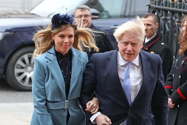 Prime Minister Boris Johnson and partner Carrie Symonds. Picture: Yui Mok/PA Wire
