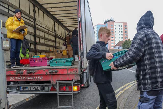 Volunteers loading goods into the artic lorry. Picture: Habibur Rahman.