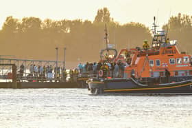 Around 120 migrants arrived in Portsmouth, Hampshire after being transferred from a single dingy south of the Isle of Wight in the English Channel by two RNLI lifeboats