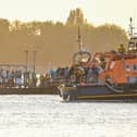 Around 140 migrants arrived in Portsmouth after being transferred from a single dingy south of the Isle of Wight in the English Channel by two RNLI boats