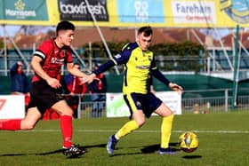 Ryan Pennery, right, in action for Gosport Borough last season. Picture by Tom Phillips.
