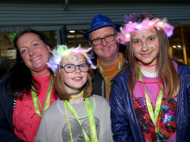 Elaine and Andy Barber with Grace, 10, front left, and Abigail, 12. Starlit Walk in aid of Rowans Hospice, Portsmouth Historic Dockyard, HM Naval Base PortsmouthPicture: Chris Moorhouse (jpns 261023-16)