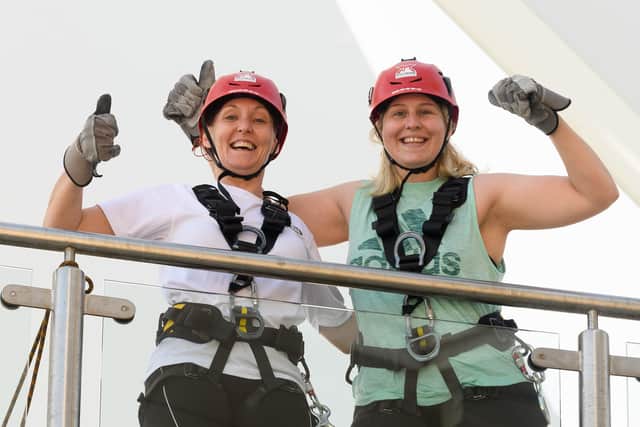 Pictured is: Chantelle Knight and Monnie Fard before their descent.
Picture: Keith Woodland (170721-15)