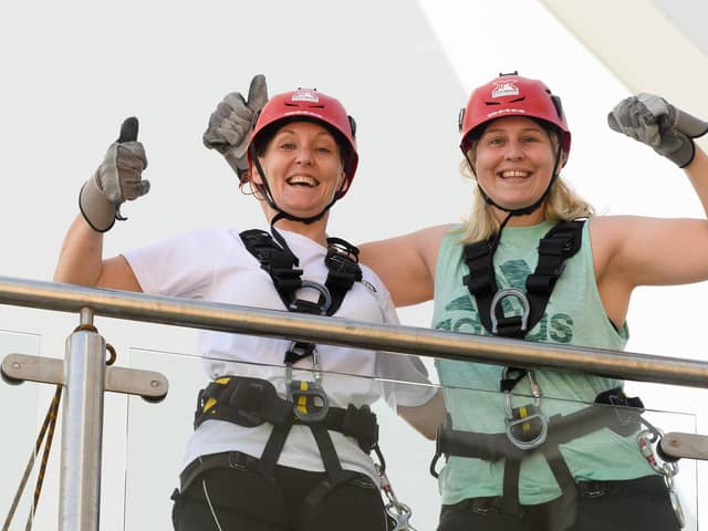 Pictured is: Chantelle Knight and Monnie Fard before their descent.

Picture: Keith Woodland (170721-15)
