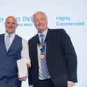 Scott Dickson receives his award from CECA Southern Chair, Alan Cox