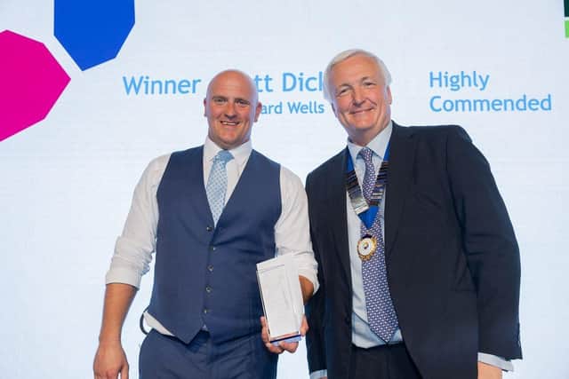 Scott Dickson receives his award from CECA Southern Chair, Alan Cox