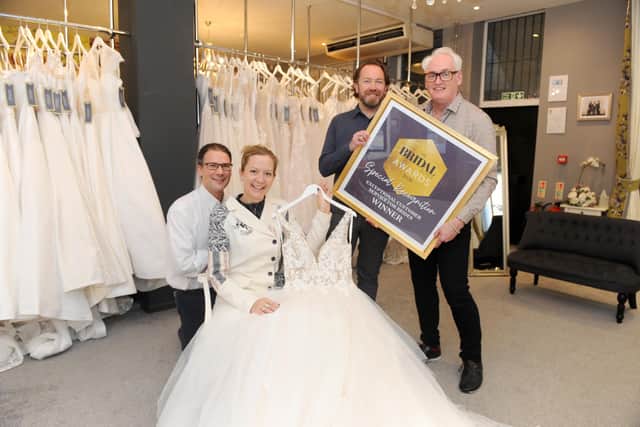 Sara Courtney from Gosport, nominated Creatiques Bridal Boutique in Southsea for the Exceptional Customer Service for Brides award in The Bridal Buyer Awards 2020 which they won.
Pictured is: Mike Purkiss with his fiance Sara Courtney and owners of Creatiques Bridal Boutique Robert and Andrew Pearce.
Picture: Sarah Standing (221020-6412)