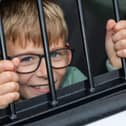 Caleb, 8, found himself behind bars at the Port Solent 999 Day.  Photos by Alex Shute