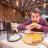 Reporter Joe Buncle eating the Portsmouth Special at Napoli Pizza and Pasta in North End
Picture: Habibur Rahman