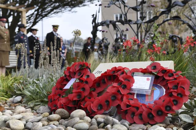 Remembrance service held at QA on 11/11/21.
caption: Poppy wreaths laid in the Garden of Life
Picture: Courtesy of Portsmouth Hospitals University NHS Trust