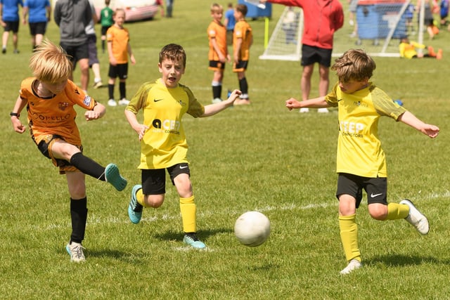 Action from the Clanfield youth football tournament at Horndean Technology College. Picture: Keith Woodland (270521-862)