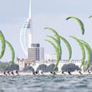 Kitesurfers compete in front of the city skyline. Picture by IKA Media / Mark Lloyd.