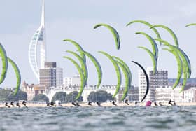 Kitesurfers compete in front of the city skyline. Picture by IKA Media / Mark Lloyd.