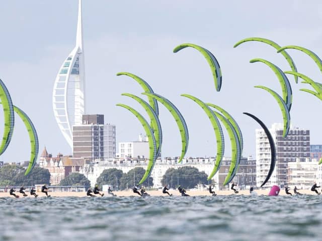 Kitesurfers compete in front of the city skyline. Picture by IKA Media / Mark Lloyd.
