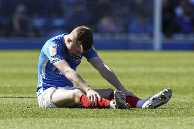 Pompey midfielder Joe Morrell tried to carry on against Lincoln but had to be withdrawn on 12 minutes.