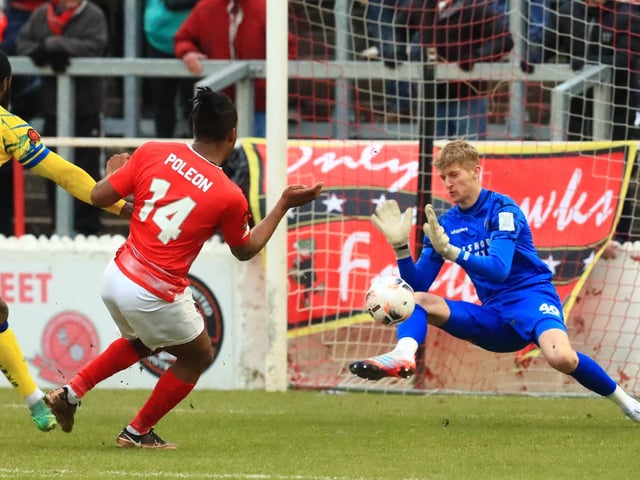 Teddy Sharman-Lowe saves a Dominic Poleon shot. Picture by Dave Haines