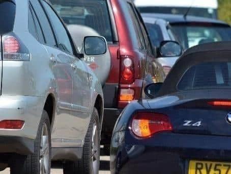 A vehicle fire is causing delays on the M3