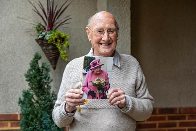 Boris Mayfield with the card he received on his 100th birthday last year. Picture: Mike Cooter (210122)