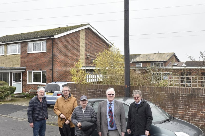 John Rowlands from Woodside, Gosport, is angry that Toob has installed an "eyesore" telegraph pole meters from his garden without prior consultation. Pictured is: Residents of Woodside in Gosport (l-r) John Rowlands, Chris Morgan, John Huckle, cllr. Steve Hammond and Barry Robertson.Picture: Sarah Standing