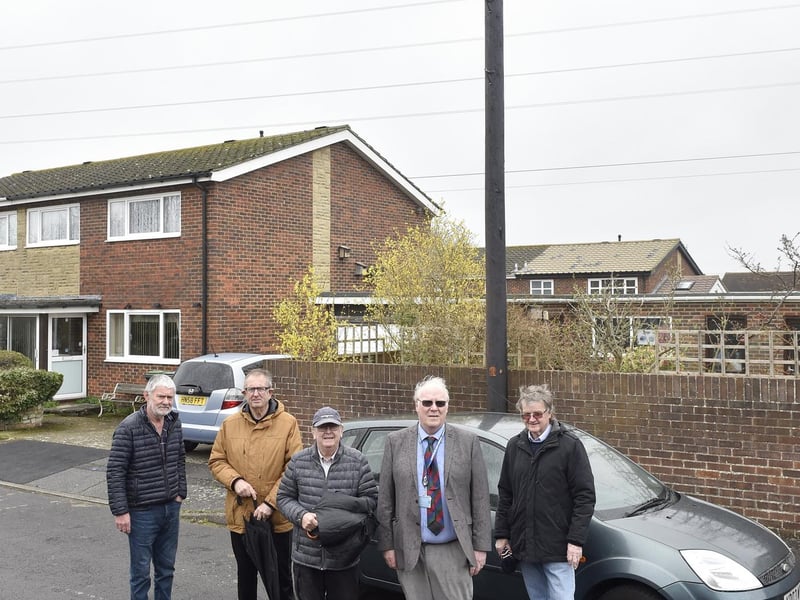 John Rowlands from Woodside, Gosport, is angry that Toob has installed an "eyesore" telegraph pole meters from his garden without prior consultation. Pictured is: Residents of Woodside in Gosport (l-r) John Rowlands, Chris Morgan, John Huckle, cllr. Steve Hammond and Barry Robertson.Picture: Sarah Standing