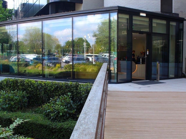 Clients and guests now enter the centre via a bridge over the stream, where a new glass atrium provides a welcoming entrance.