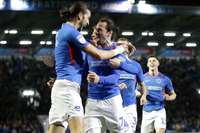 Pompey celebrate Ryan Williams' opening goal in the 3-0 win over Rochdale. Picture: Robin Jones