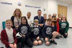 Stephen Morgan MP (Centre) and Christing Turner Head of School (Left) with children from Meon Junior School TSAT